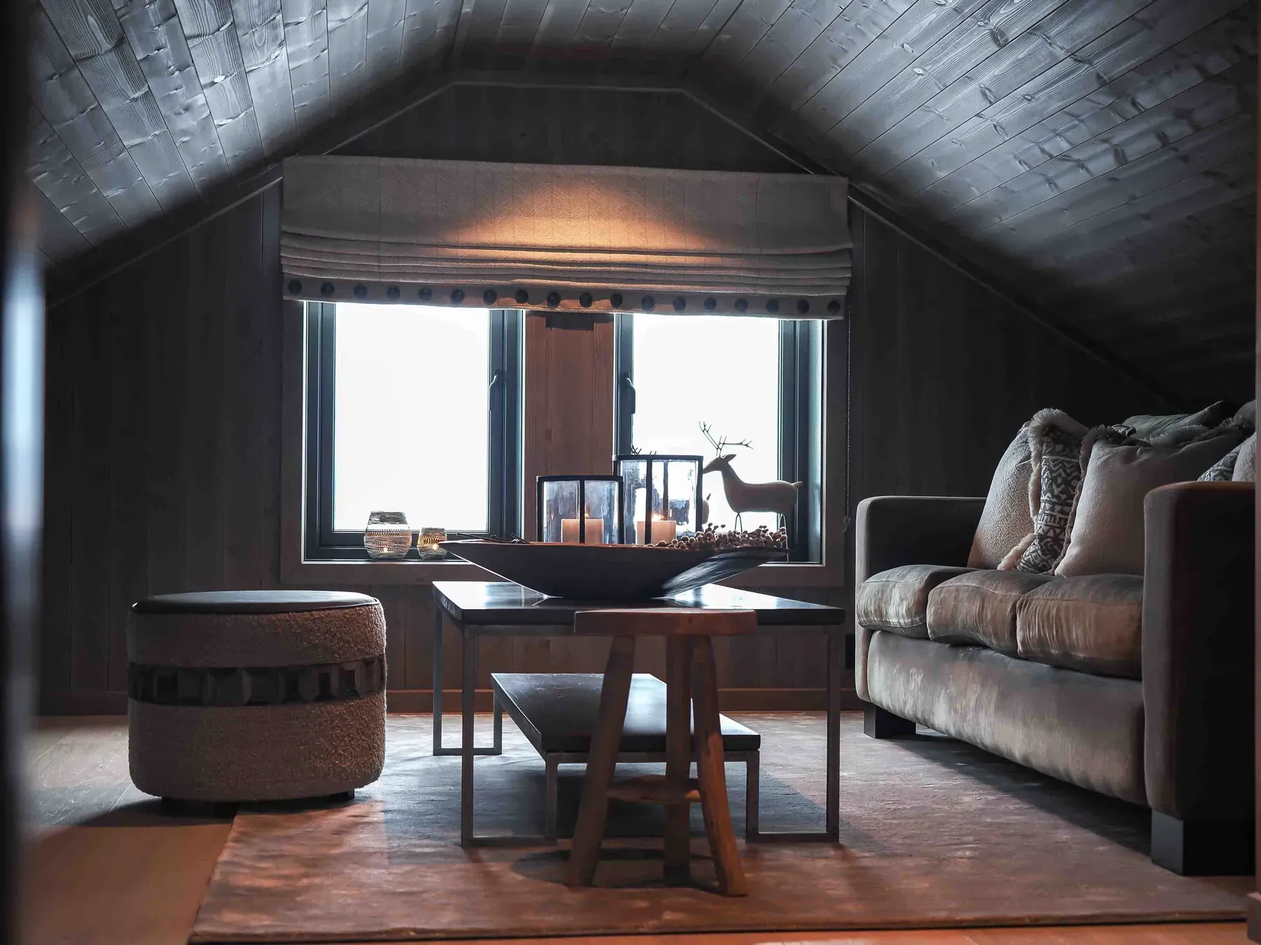 Mezzanine lounge with sofas and a view