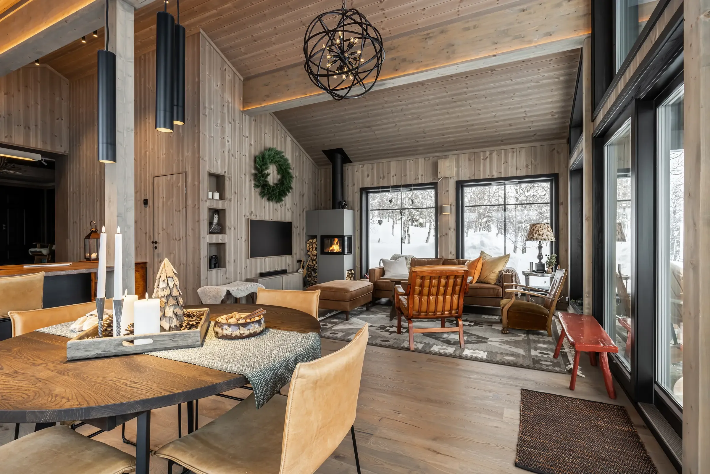 Dining and living area under an open ceiling